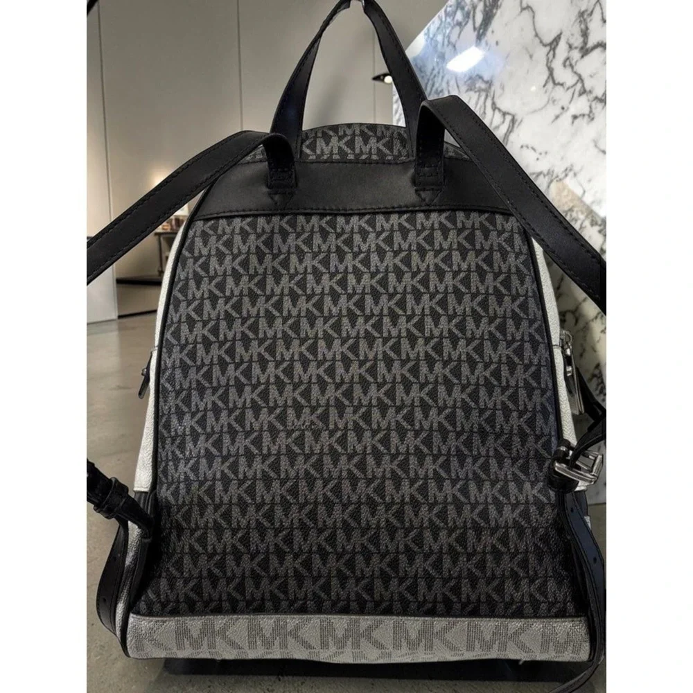 Michael Kors Rhea Medium Metallic MK Logo Backpack‎ Silver Tone Zip Bag EUC